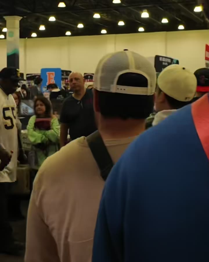 Collectors filling a card show hall