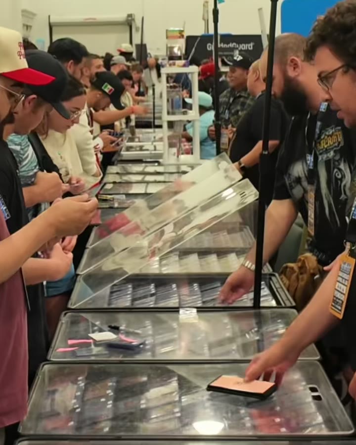 A long row of display cases lined with collectors